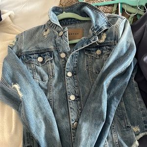 Distressed jean jacket